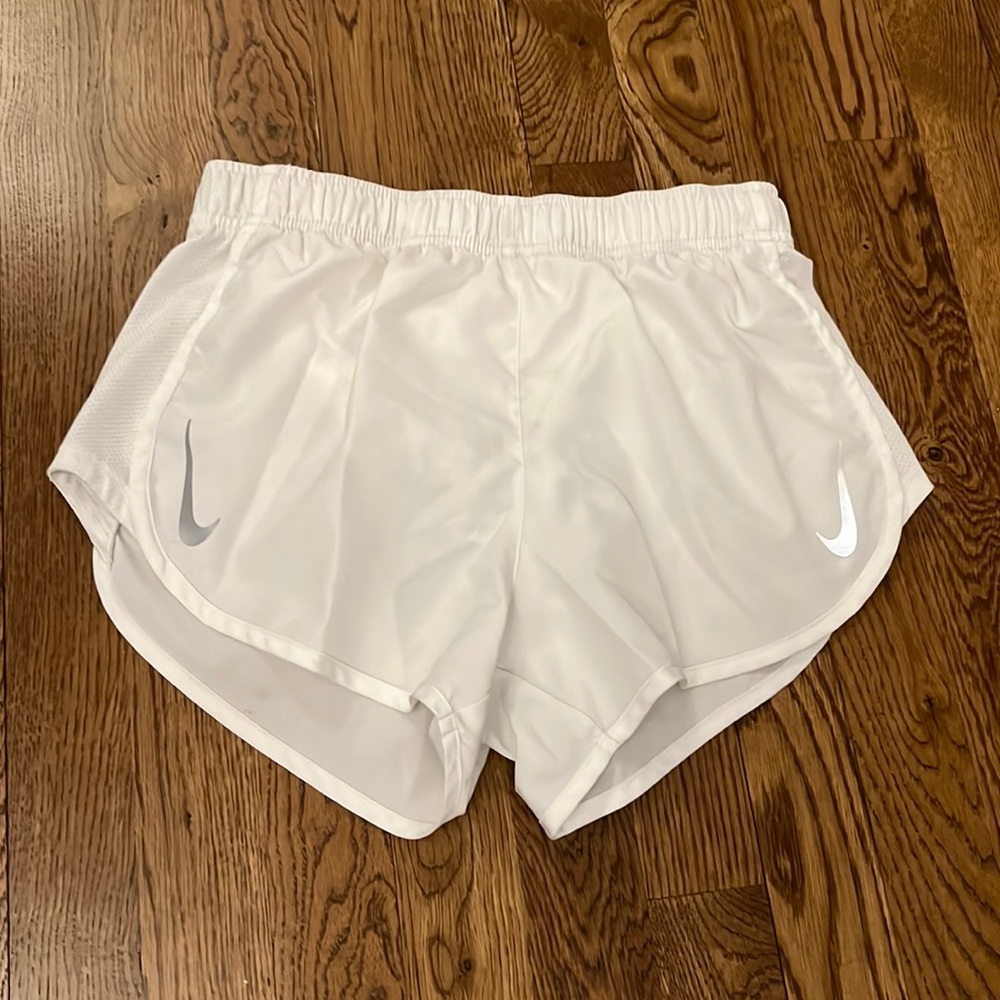 White Nike shorts